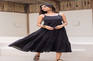 Embrace Sophistication with Every Step in a Stylish Black Maxi Dress